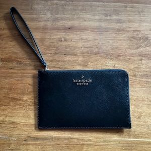 Brand new Kate Spade tech wristlet.